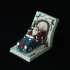 Polyresin Santa drive blue car with Xmas tree ornament with LED in the book